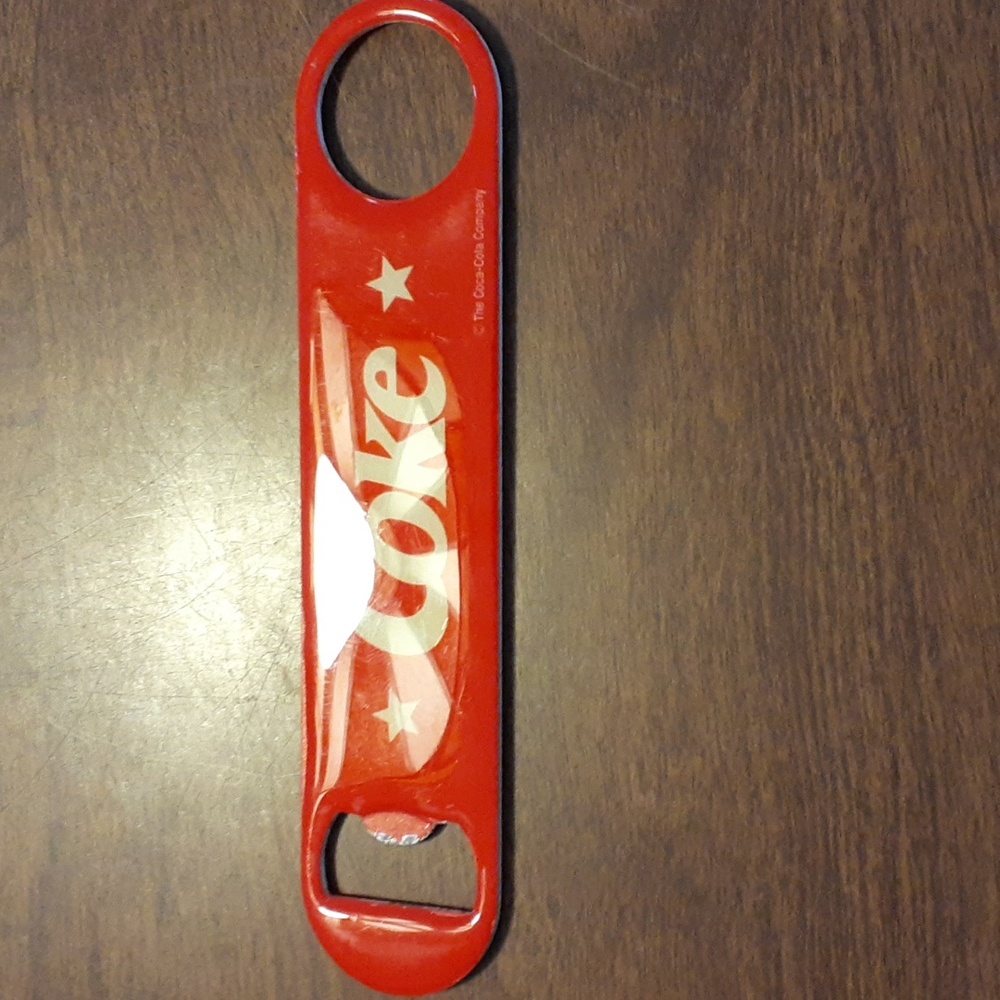 Vintage Flat Coca-Cola bottle opener.
